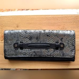 Kenneth Cole Reaction Clutch